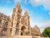 Low-angle view of the entry to the terracotta Hintze Hall of the Natural History Museum in London