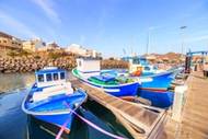 Colourful fishing boats in the resort of Gran Tarajal in Fuerteventura