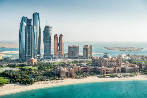 Helicopter point of view of sea and skyscrapers in Corniche bay in Abu Dhabi
