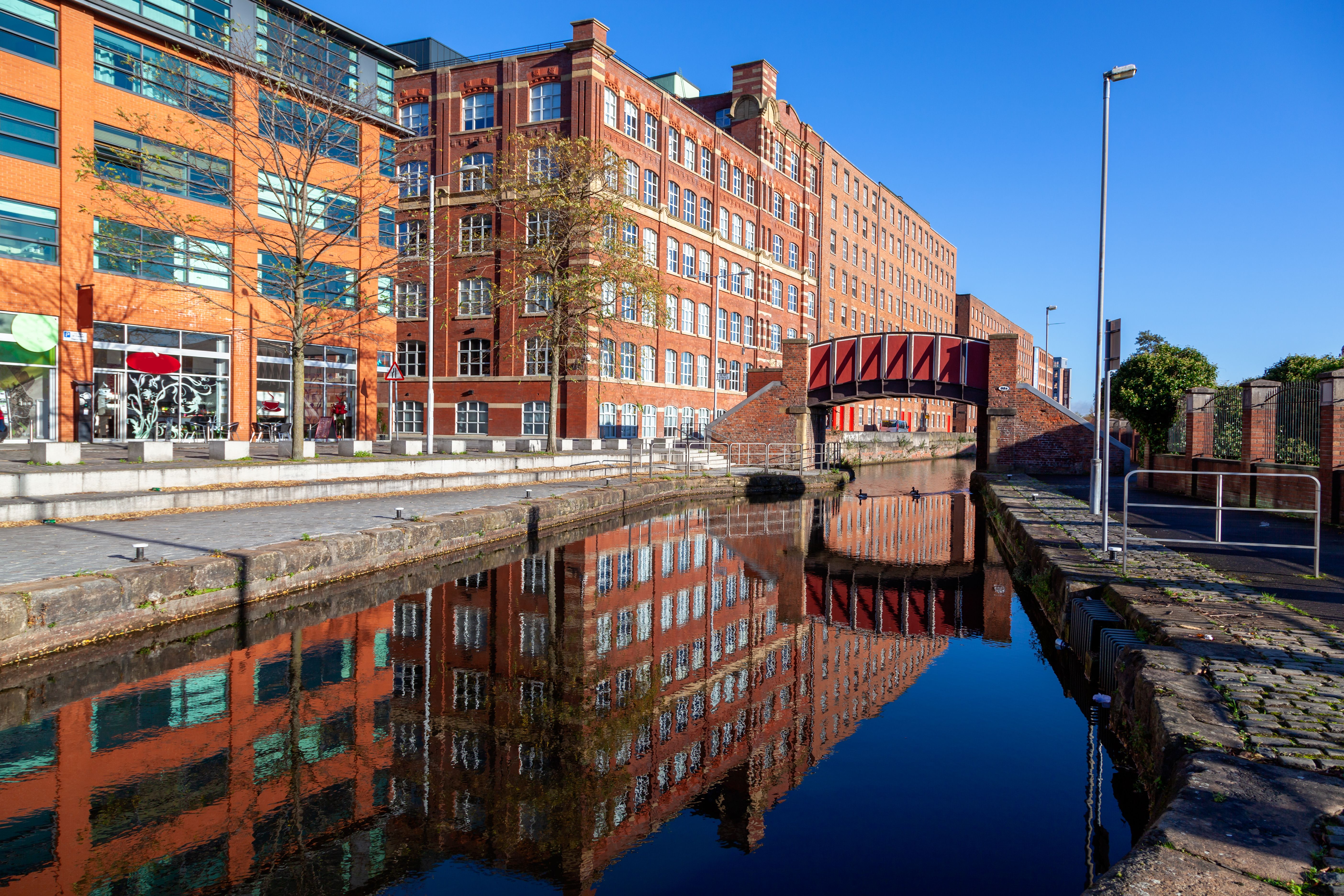 A canal and red-brick warehouses in Ancoats, near the Northern Quarter, in Manchester