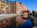A canal and red-brick warehouses in Ancoats, near the Northern Quarter, in Manchester