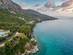 View of a road running along the rocky coastline of Corfu