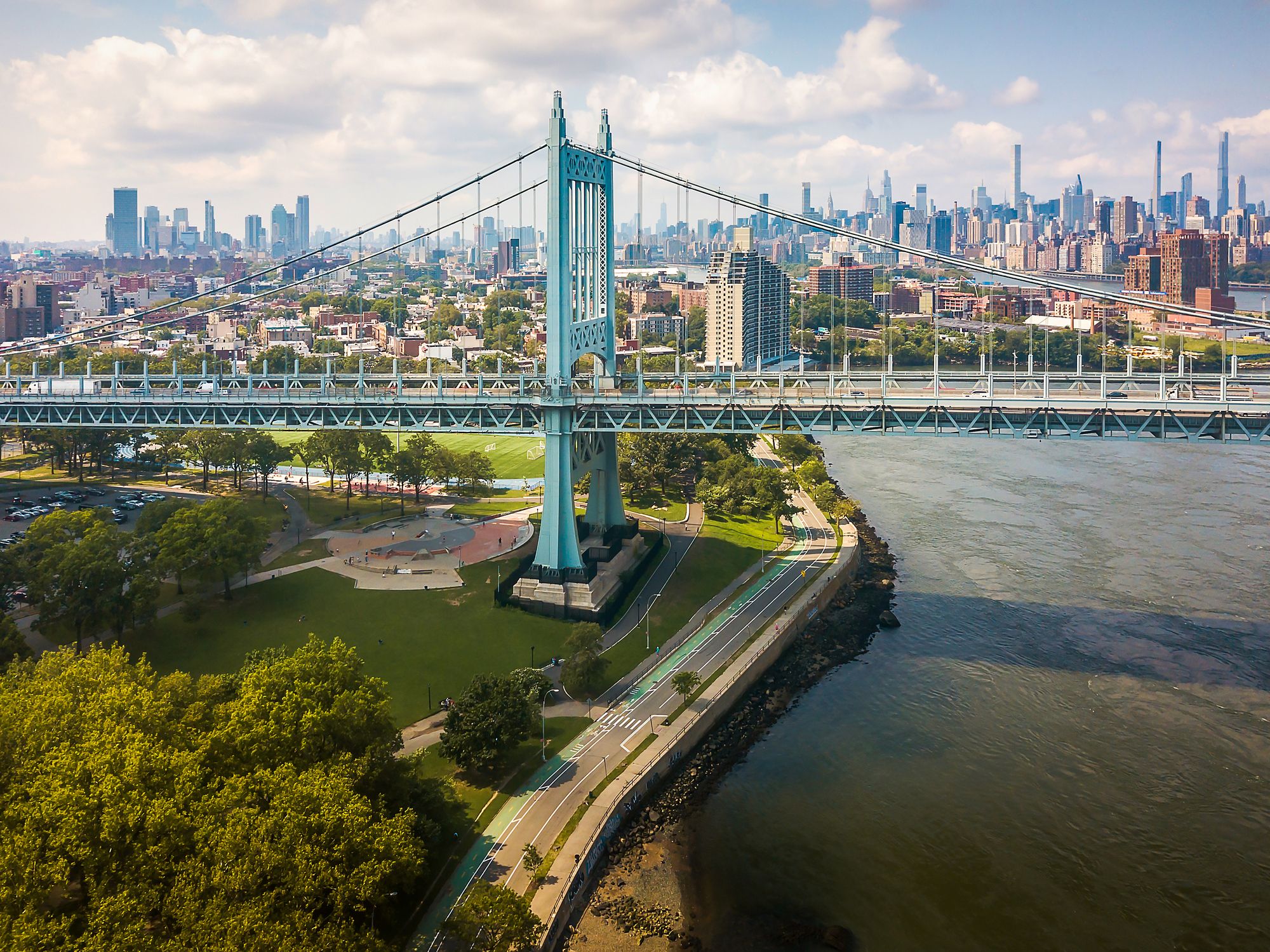 View of Robert F. Kennedy Bridge, Astoria park and East River and Manhattan island in New York, USA