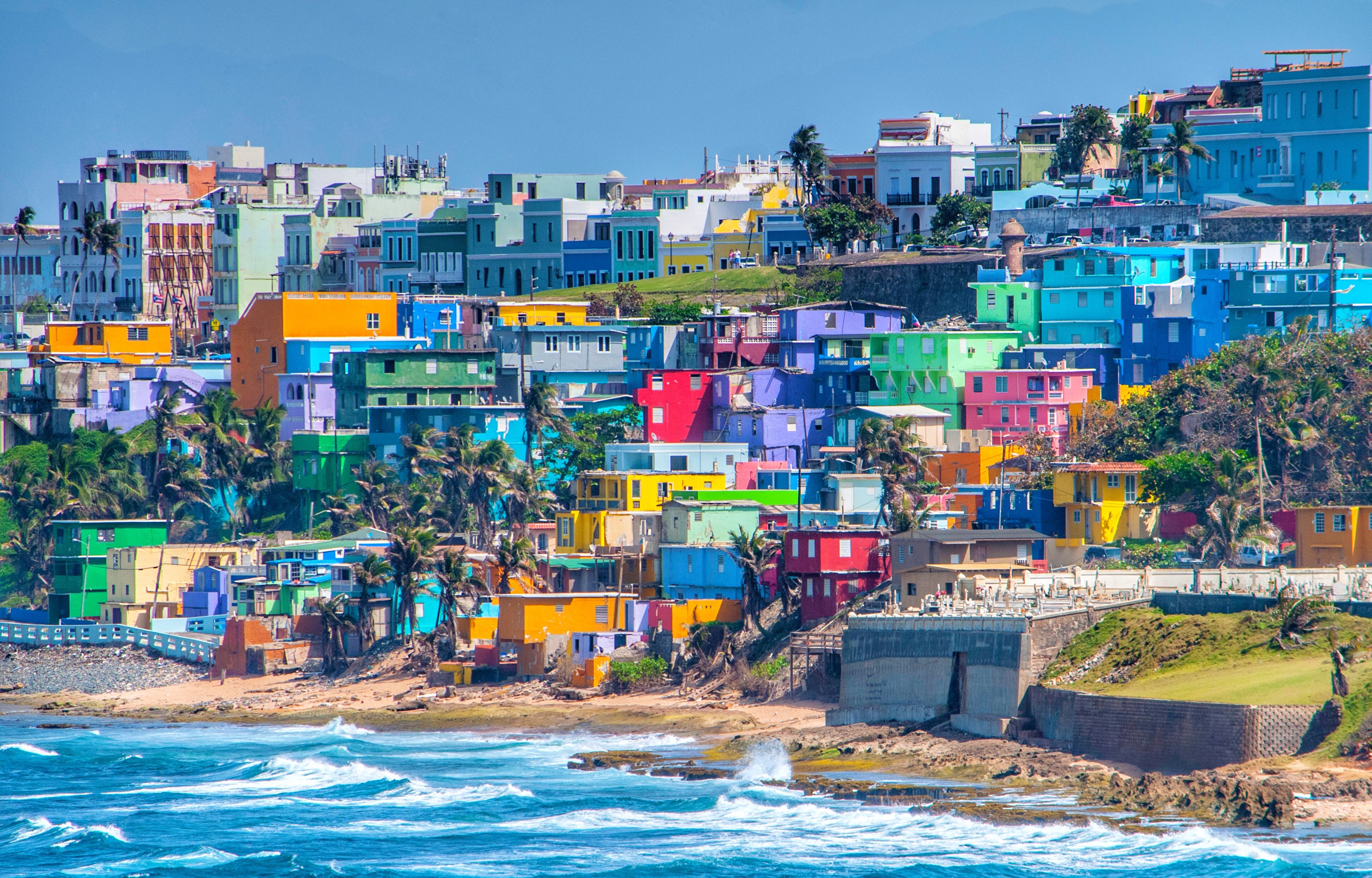 A view of colourful stacked houses on Puerto Rico's coast, the Caribbean