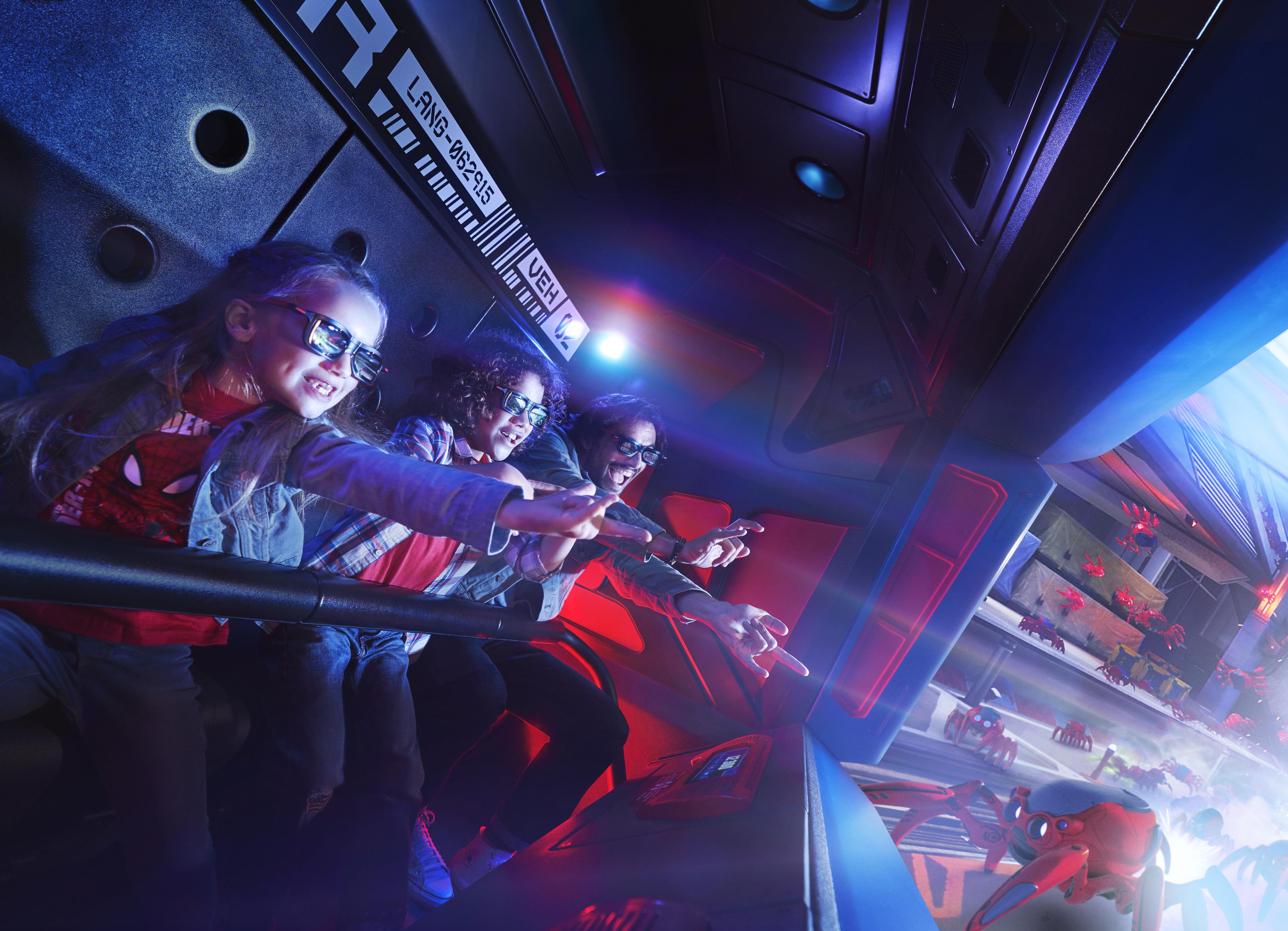 A family on a 3D ride at Disneyland Paris