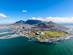 Aerial view of Cape Town with the Victoria & Alfred Waterfront, DHL Stadium, Mouille Point Beach all featured and Table Mountain looming over the city