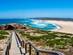 A wooden walk way leading down to Praia da Bordeira in Portugal