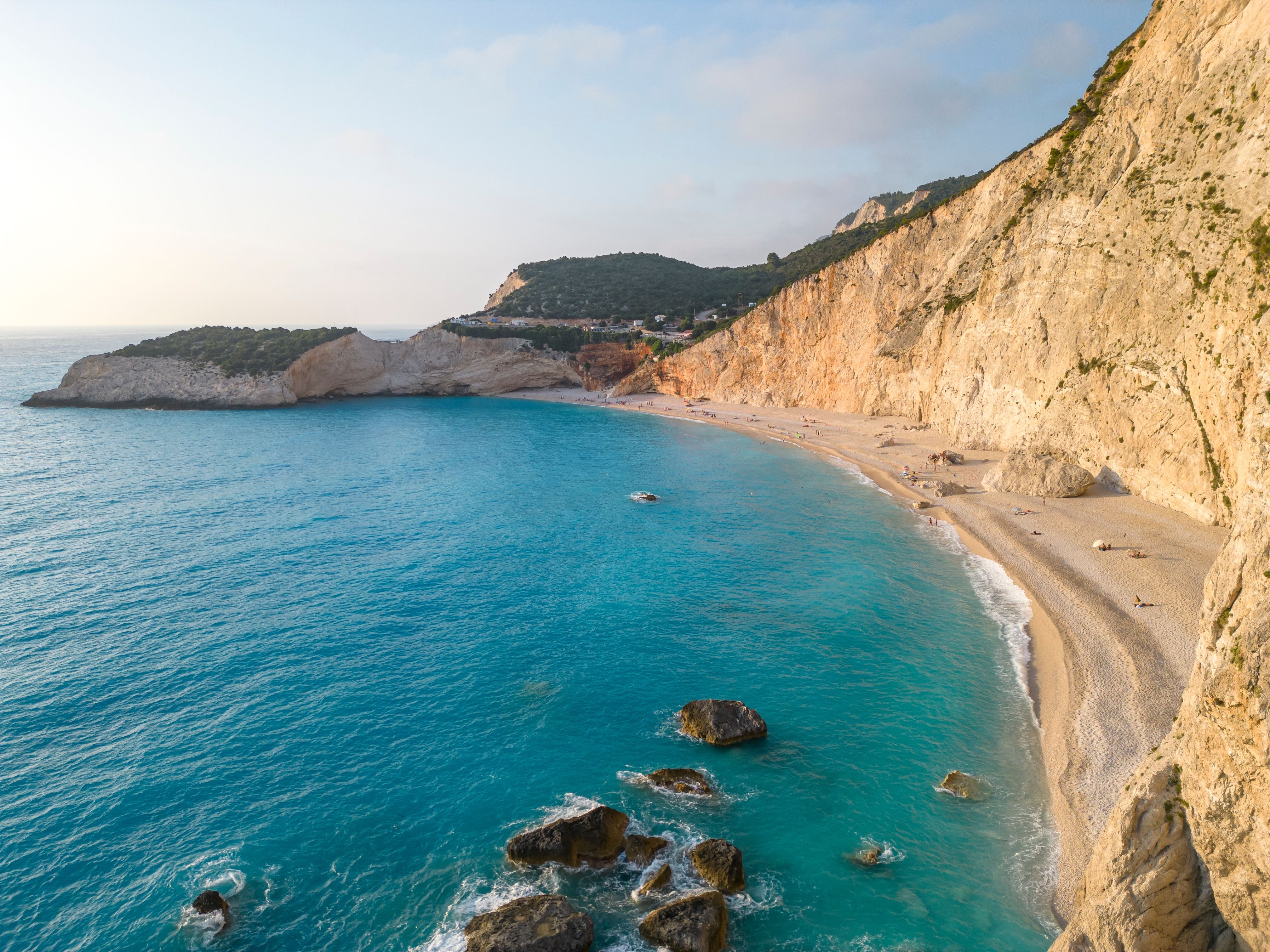 Aerial view of the white cliffs and turquoise waters of Porto Katsiki Beach in Lefkada