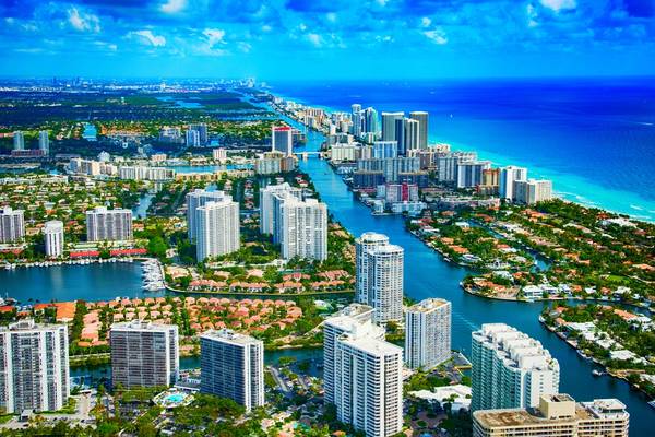 Aerial view of the city of Hallandale Beach located in Broward County Florida showing the port, harbour beach and city on a sunny day