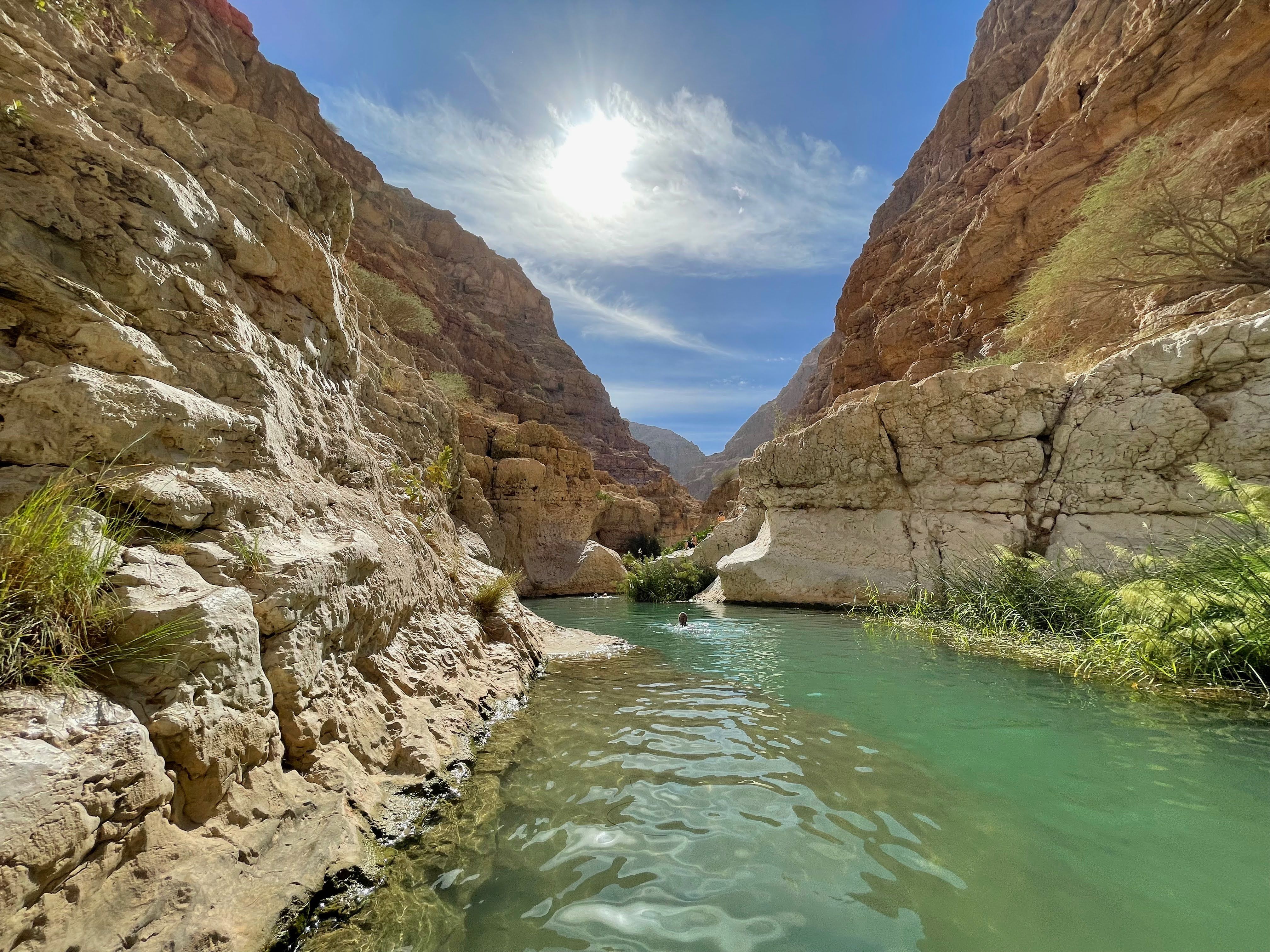 View of Wadi Shab canyon and natural pool in Oman