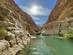 View of Wadi Shab canyon and natural pool in Oman