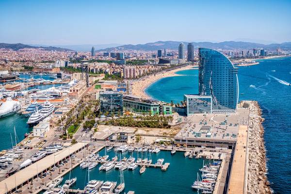 Aerial view of Port Vell, Barcelona beach and city of Barcelona