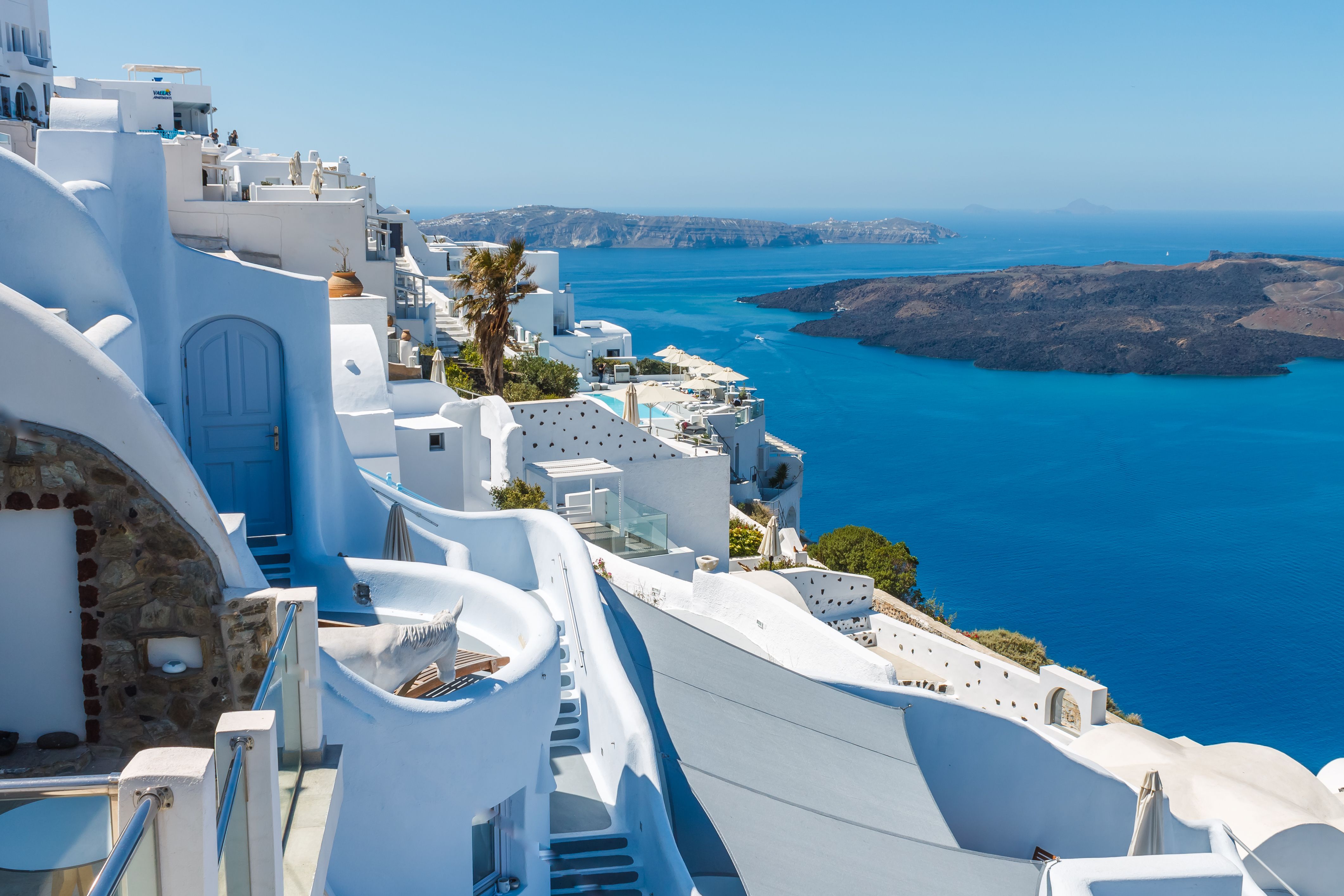 View over the whitewashed, cliff-edge buildings overlooking Santorini's caldera