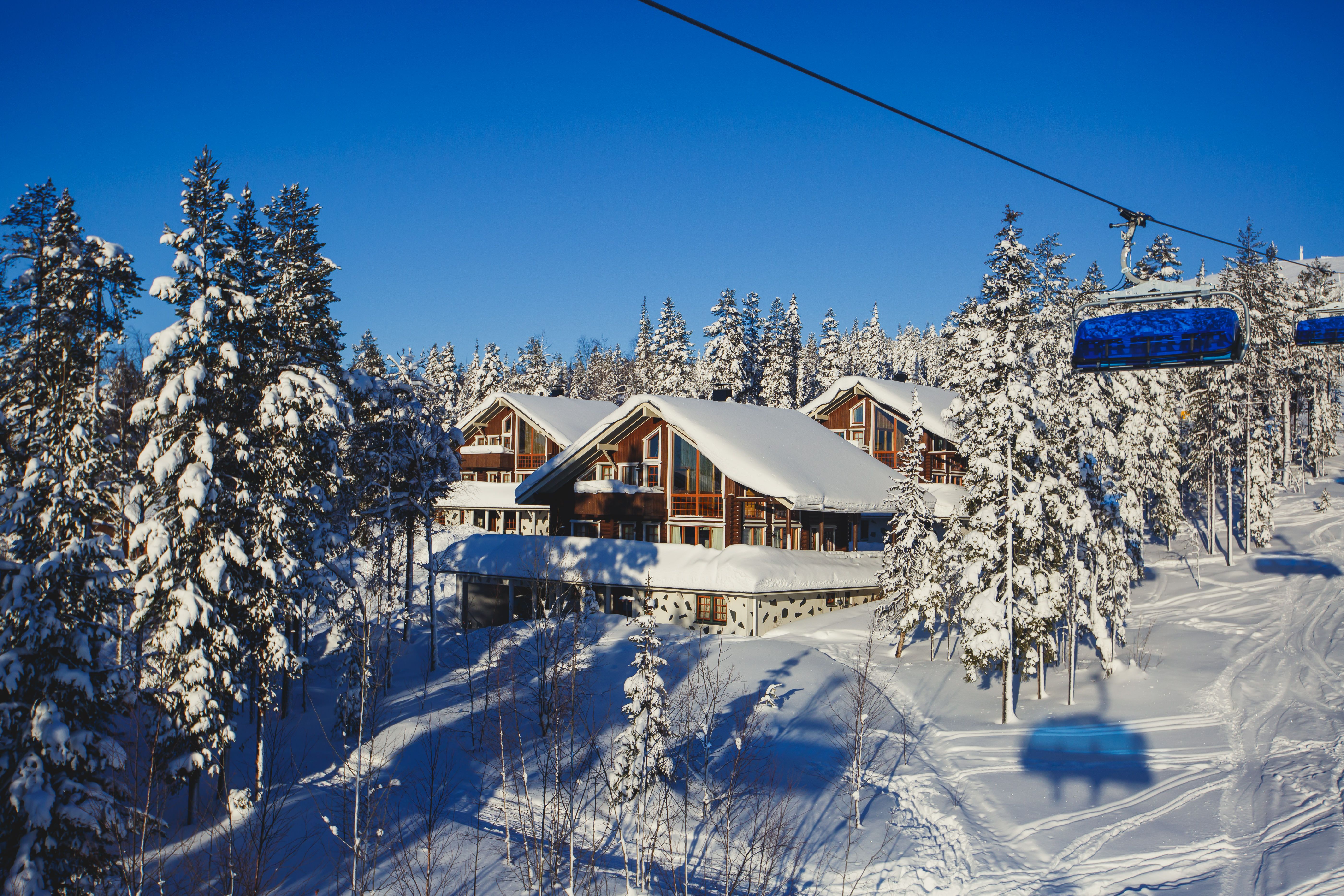 Ski chalets in the mountains covered in thick snow