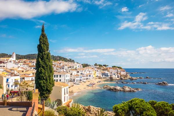Seaside town and natural bay of Calella de Palafrugell in Girona Province on a sunny day in Catalonia's Costa Brava of Spain