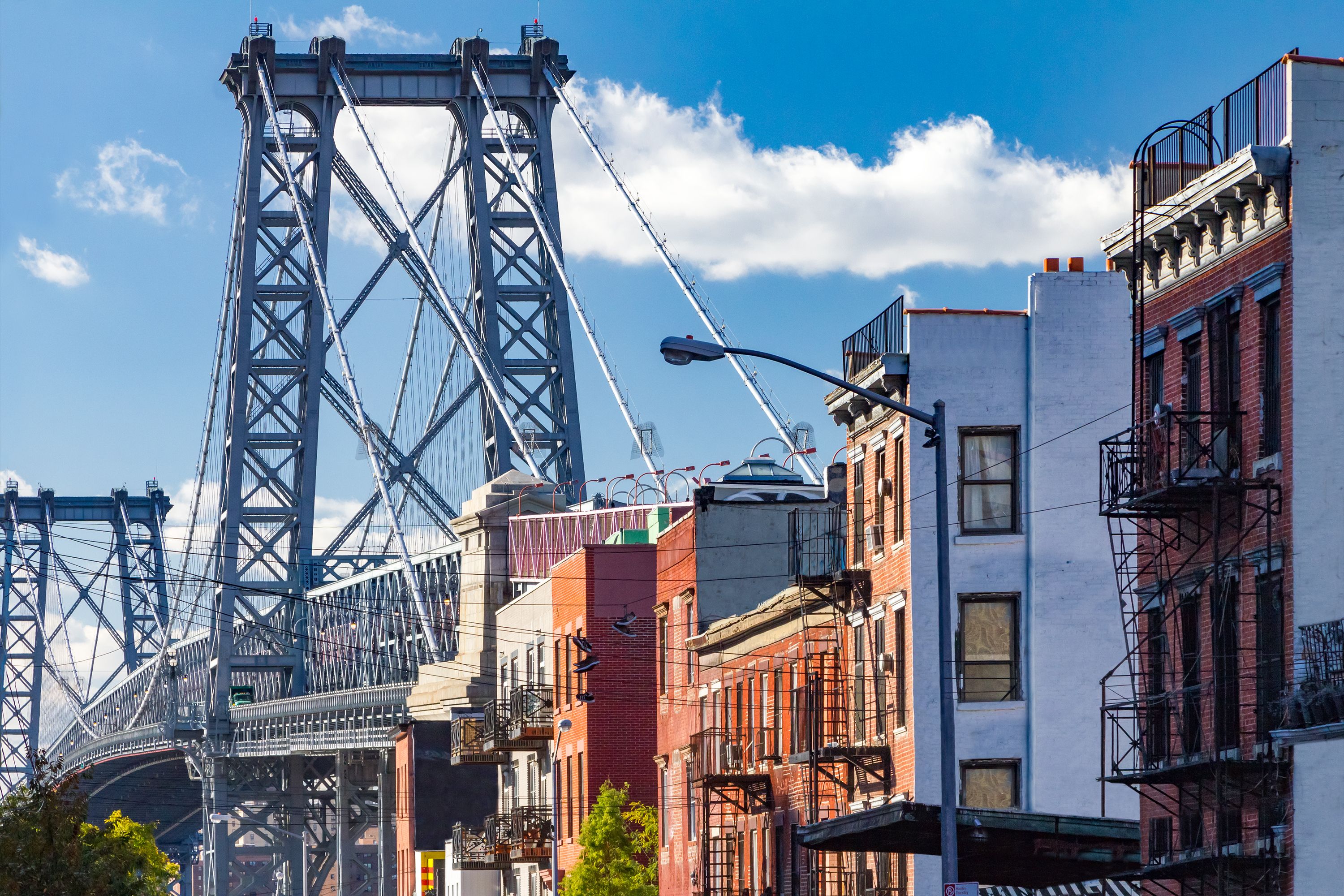 Brooklyn street scene with block of buildings near the Williamsburg Bridge in New York City
