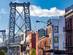 Brooklyn street scene with block of buildings near the Williamsburg Bridge in New York City