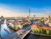Aerial view of Berlin skyline with famous TV tower and Spree river in beautiful evening light at sunset, Germany.