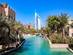 A view of the Burj al Arab in the distance from Madinat Jumeirah in Dubai on a sunny day
