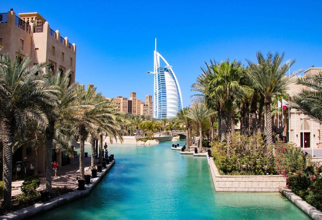 A view of the Burj al Arab in the distance from Madinat Jumeirah in Dubai on a sunny day