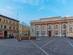 View of Piazza del Popolo (the central square) in Pesaro with Post Office and Neptune fountain