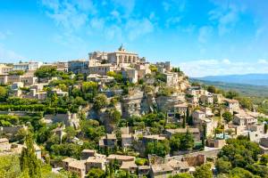 The hilltop town of Gordes, crowned by a stone castle and with views over the Luberon Valley