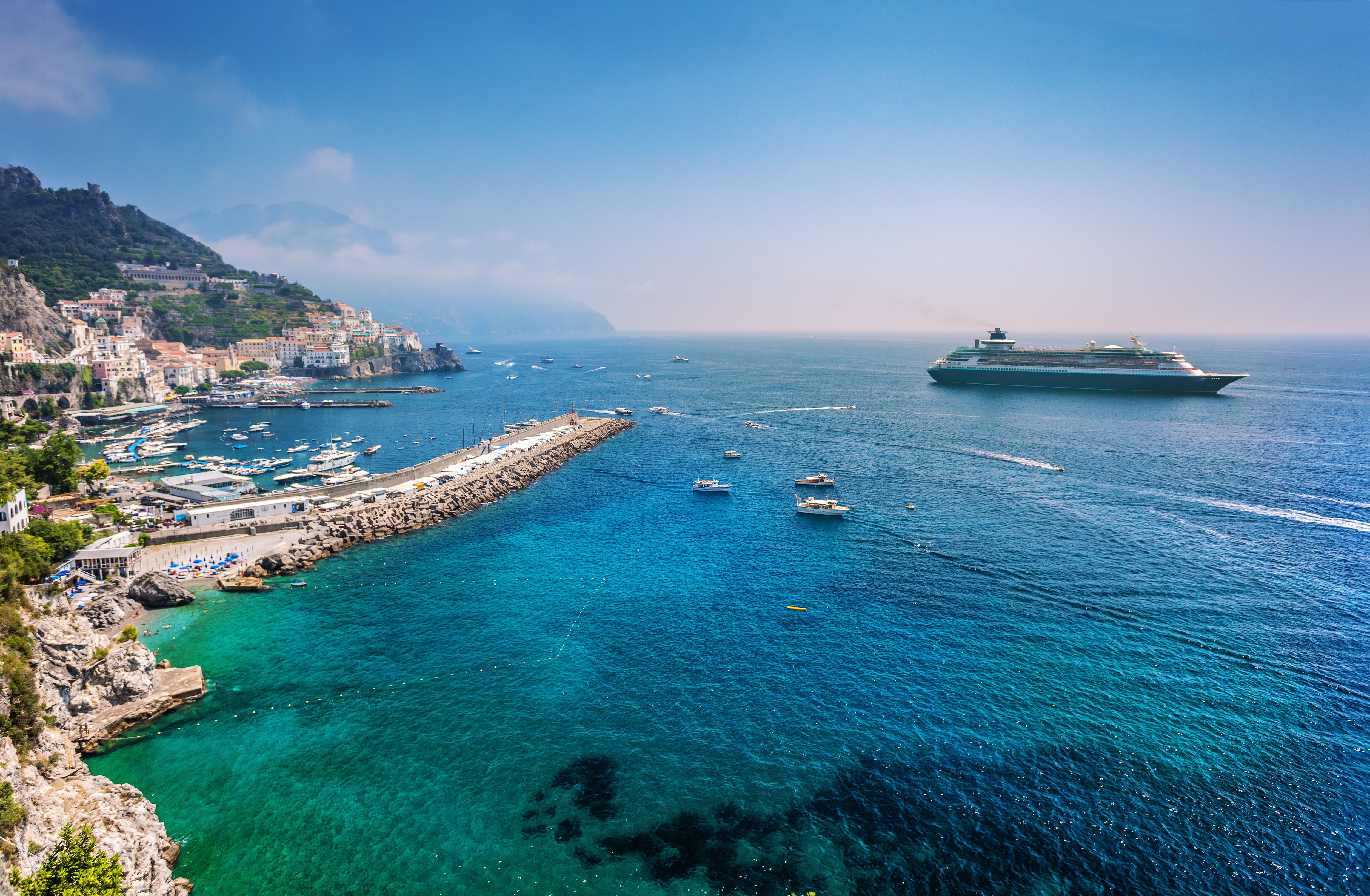 A clear sunny day showing a cruise liner just off the coast of Salerno on the Amalfi coast in Italy
