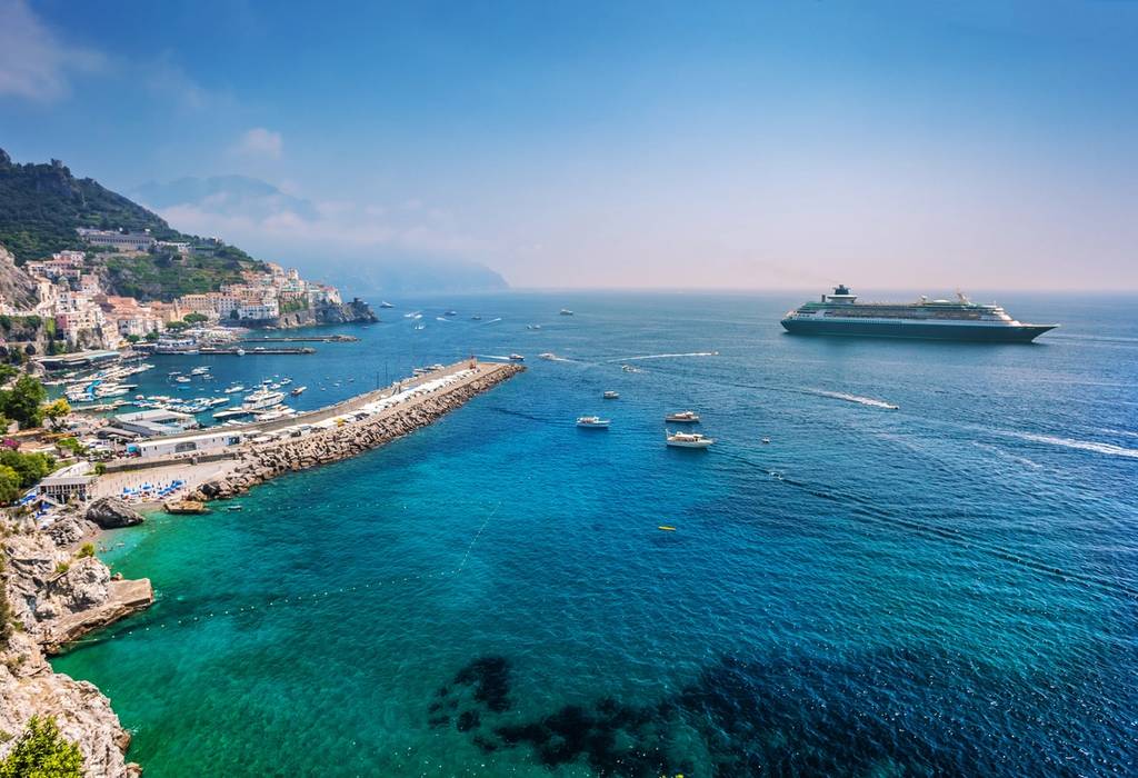 A clear sunny day showing a cruise liner just off the coast of Salerno on the Amalfi coast in Italy