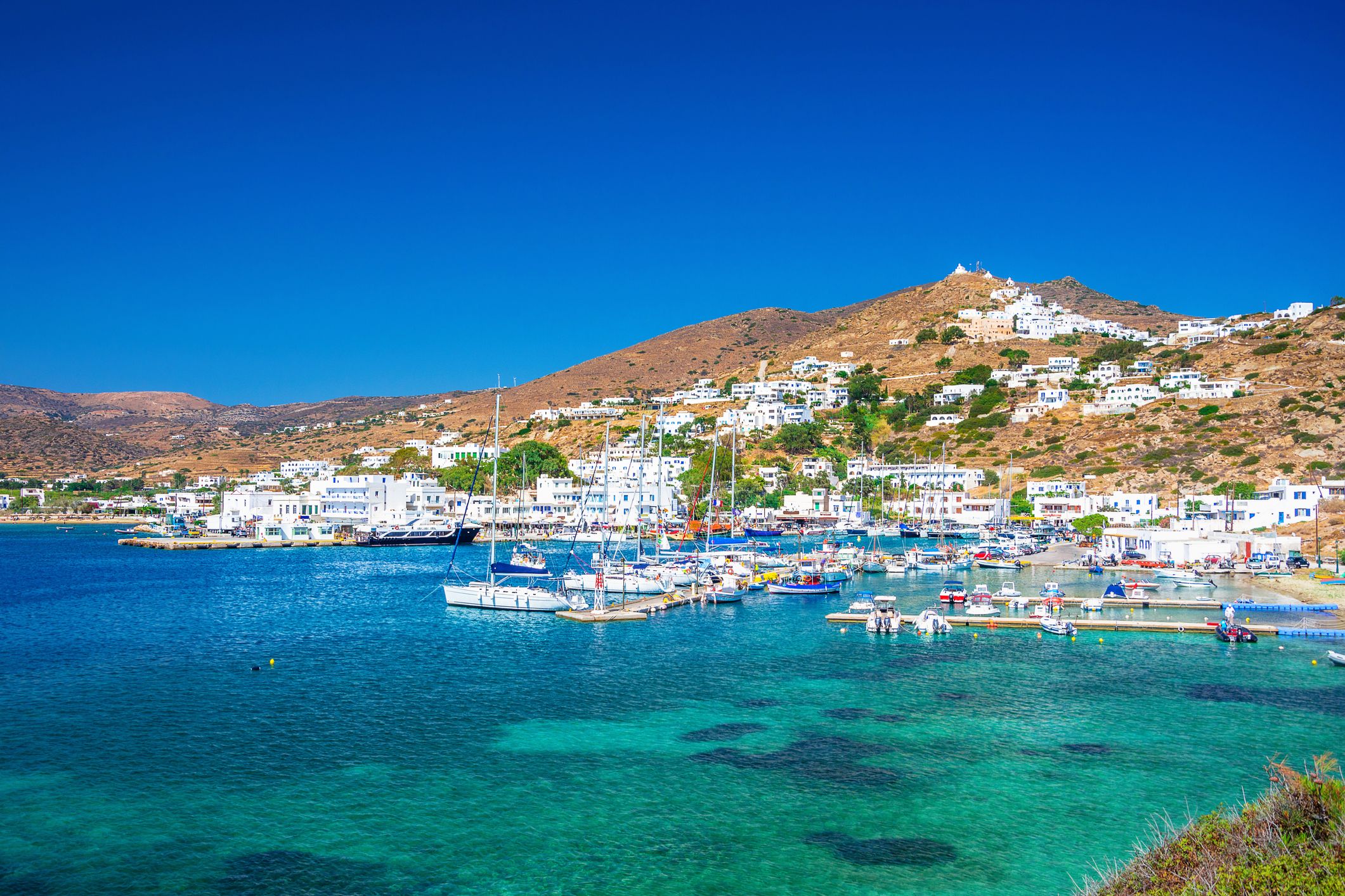 Chora town and harbour on the Cyclade island of Ios, Greece.