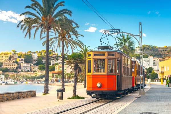 A picture of the famous orange tram that runs from Soller to Port de Soller in Majorca, Spain