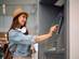 Woman using an ATM machine