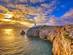 A sunset view of Cabo de Sao Vicente lighthouse in the Algarve, Portugal