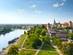 Daytime panorama of Krakow, Poland, featuring Wawel Castle.