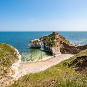 View of the chalk arch formations at Selwick Bay beach in Yorkshire, England on a sunny day