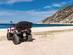 Quad bike parked on the beach of Myrtos in Kefalonia