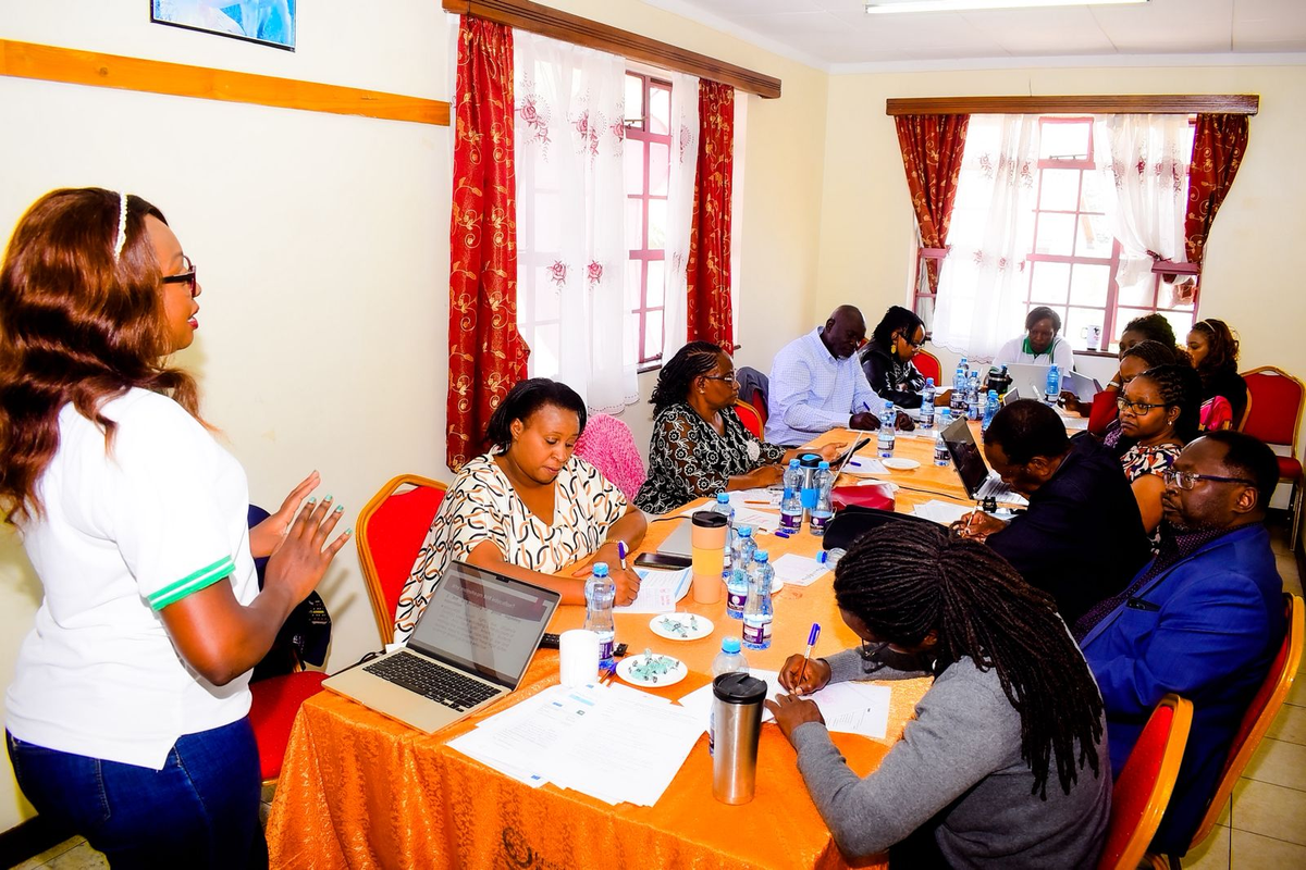 An image of Florence Shako addressing a meeting