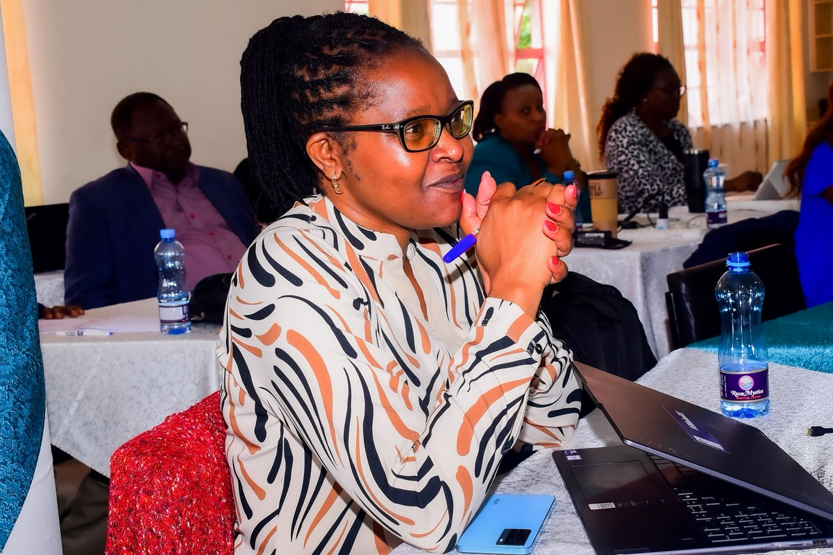 An image of a woman in the meeting