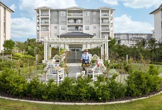 Residents enjoying the village gardens