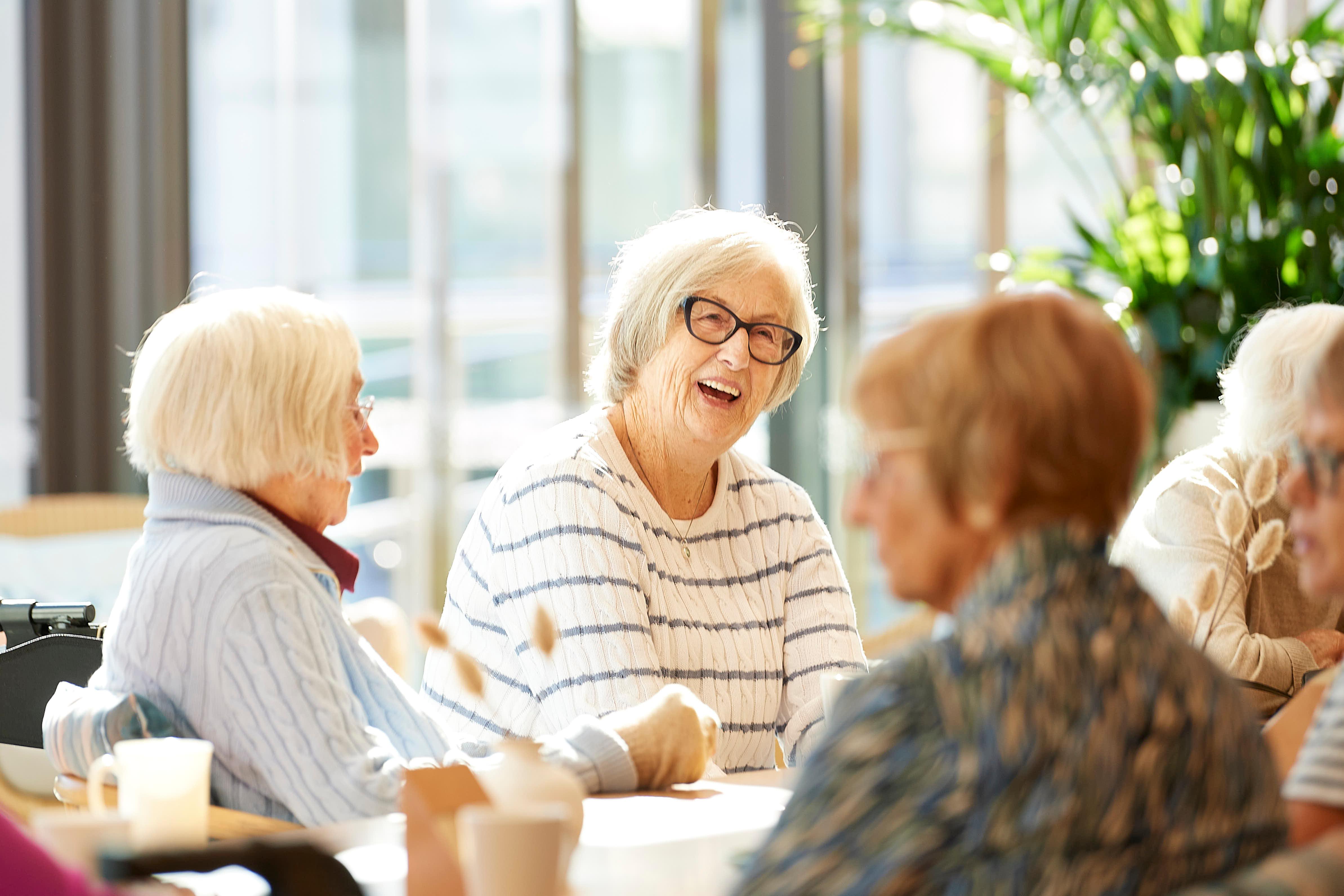 Resident talking to friends