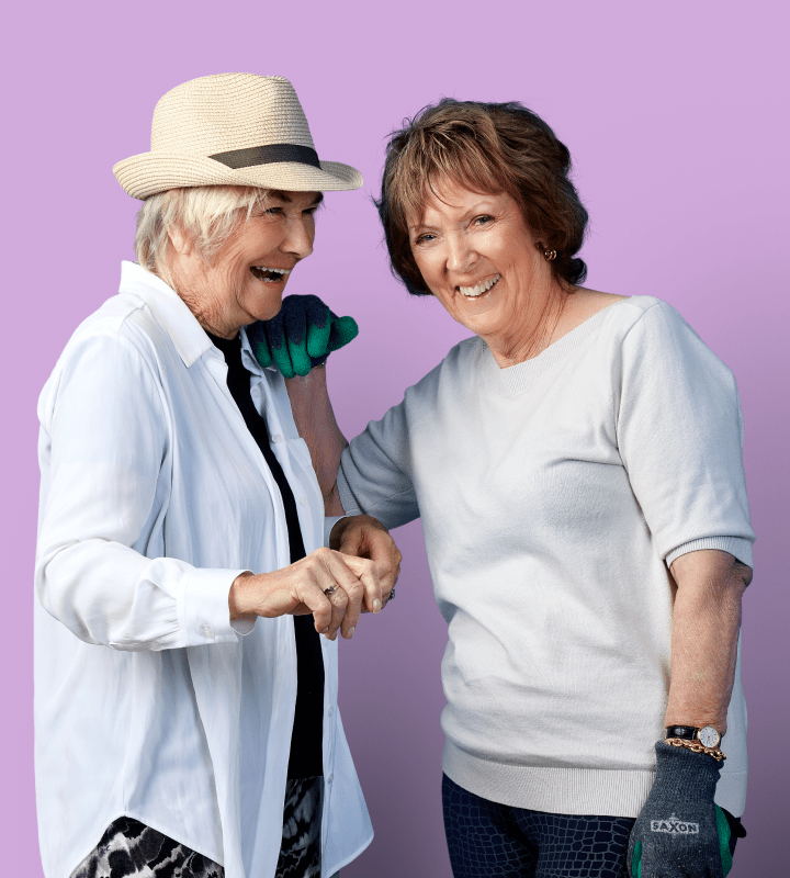 Ladies laughing on purple background