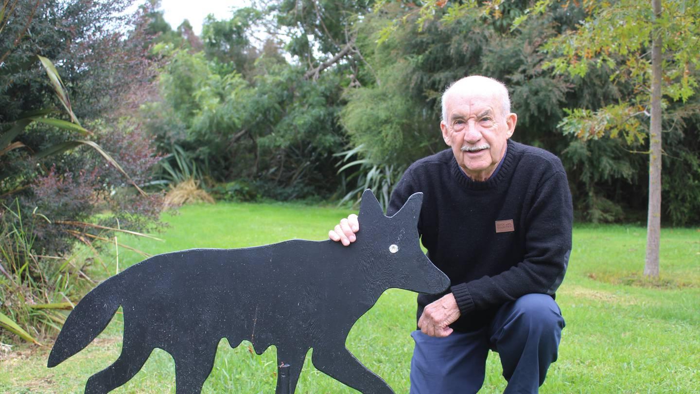 Rex Hebley and one of his hand-made wolves