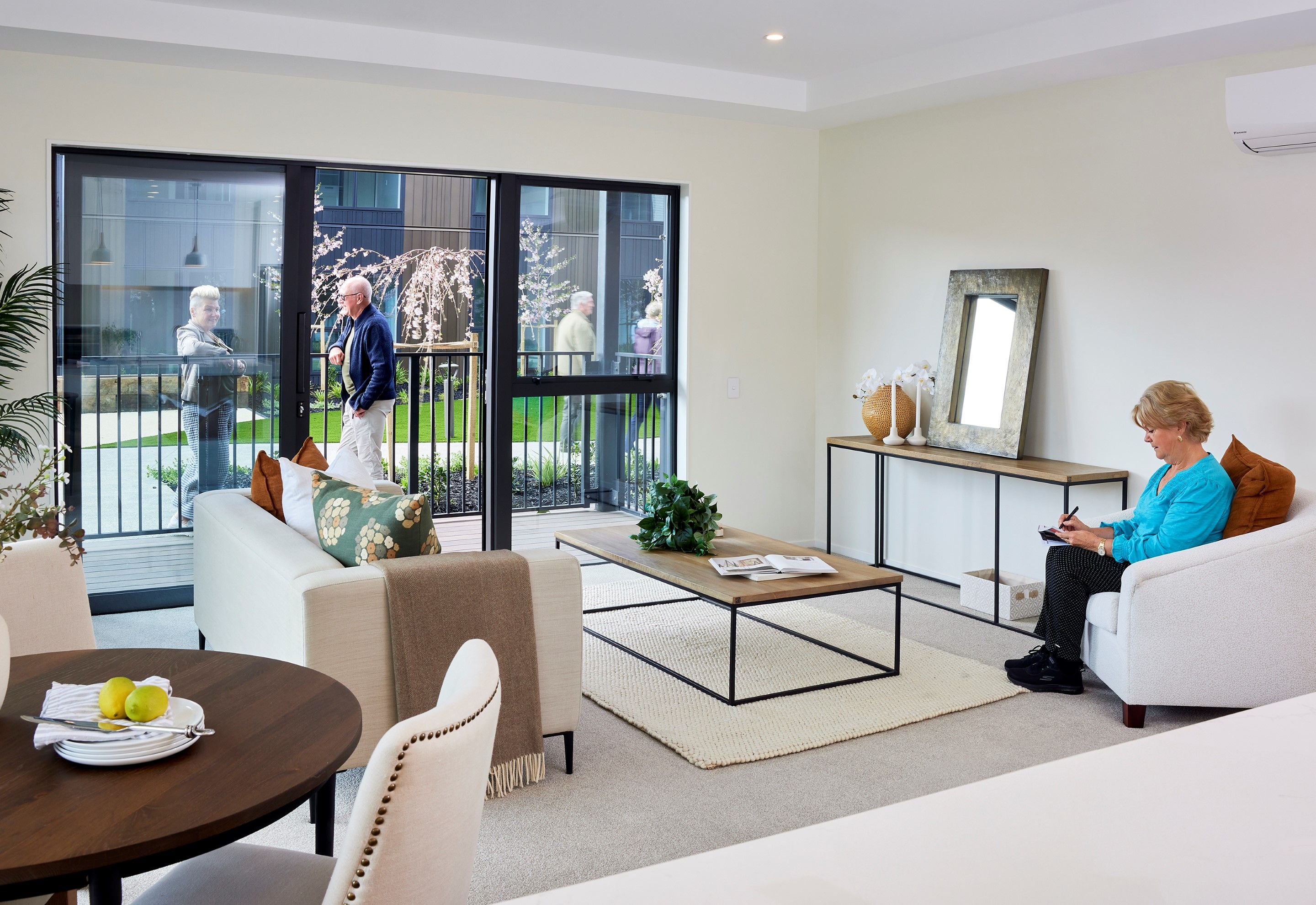 People in apartment living room