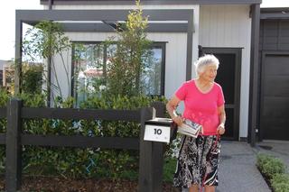Resident greeting her neighbors