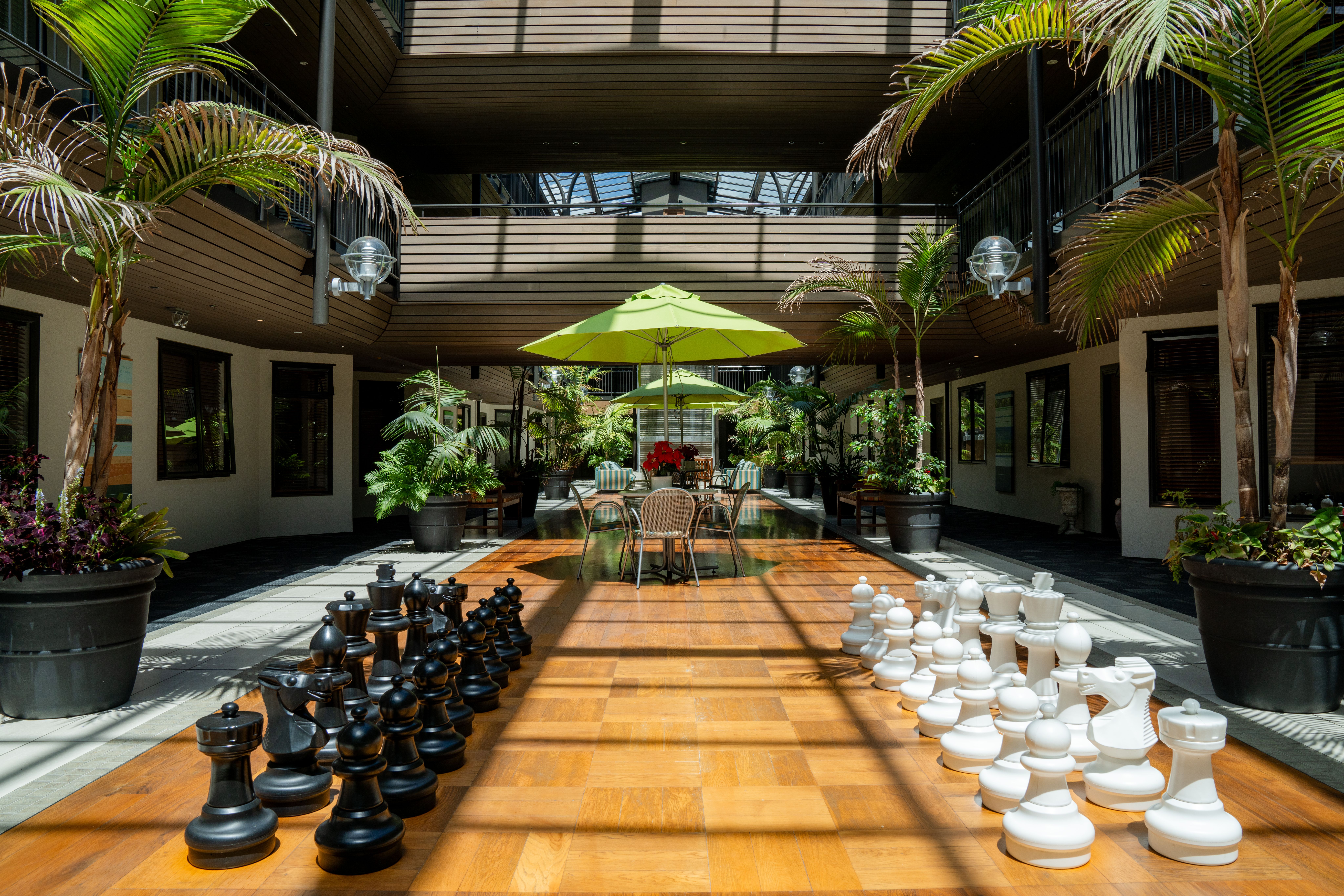 Life size chess board in the atrium at Dannemora Gardens
