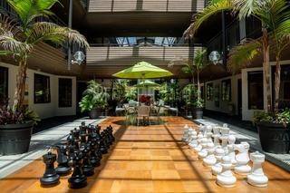 Life size chess board in the atrium at Dannemora Gardens