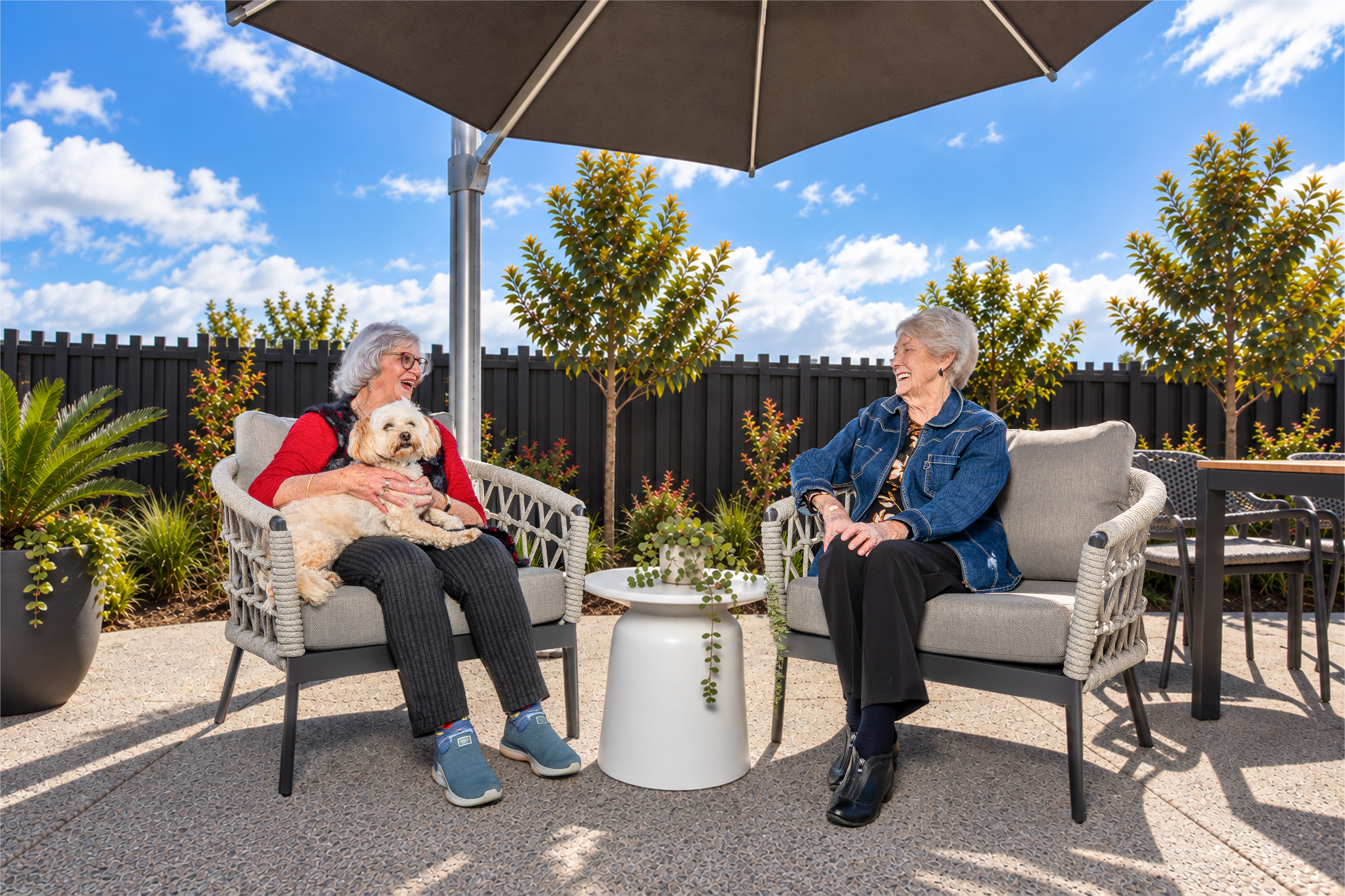 Two retirement village residents chatting in Rototuna