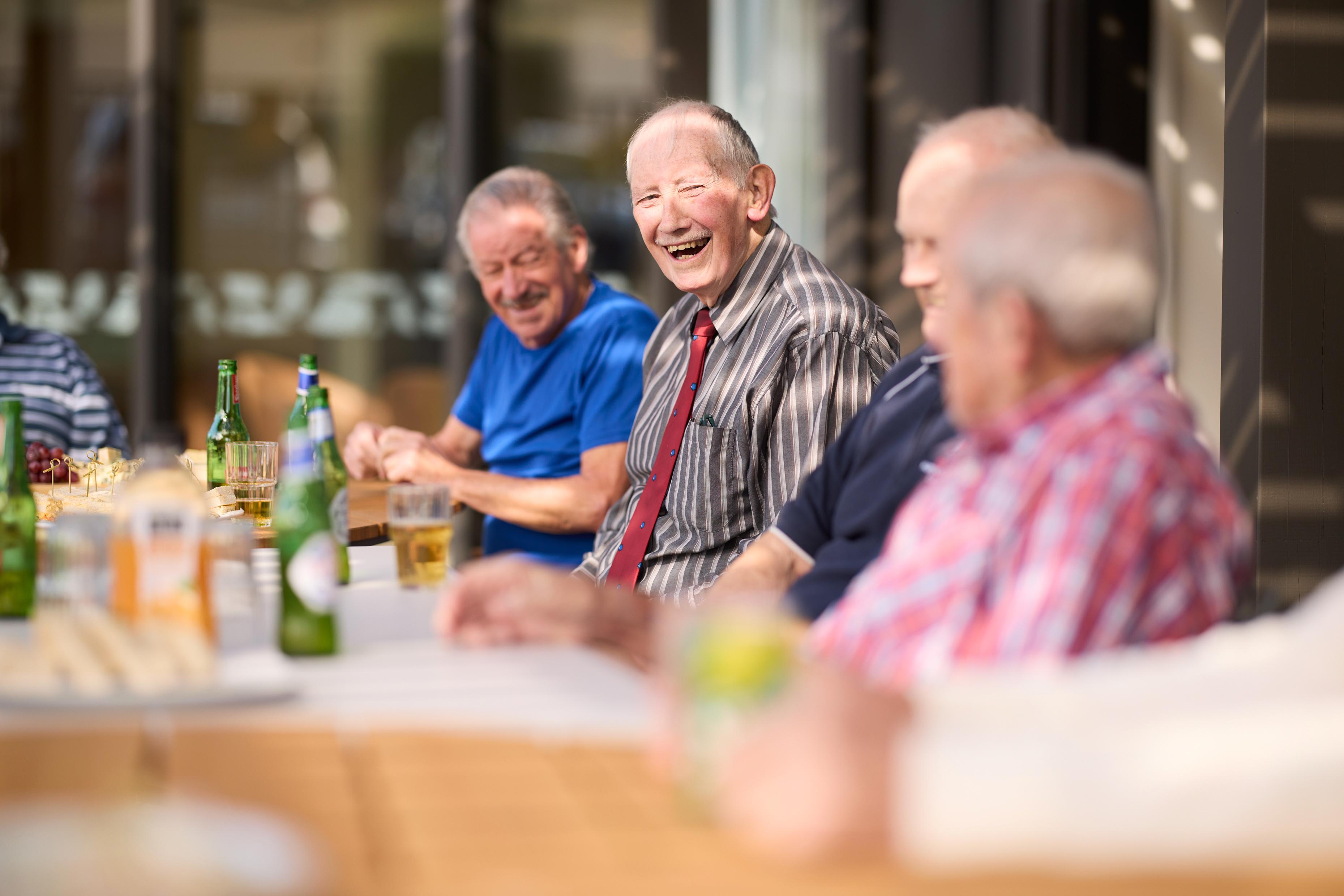 Edgewater Village residents having a laugh at the monthly meet up