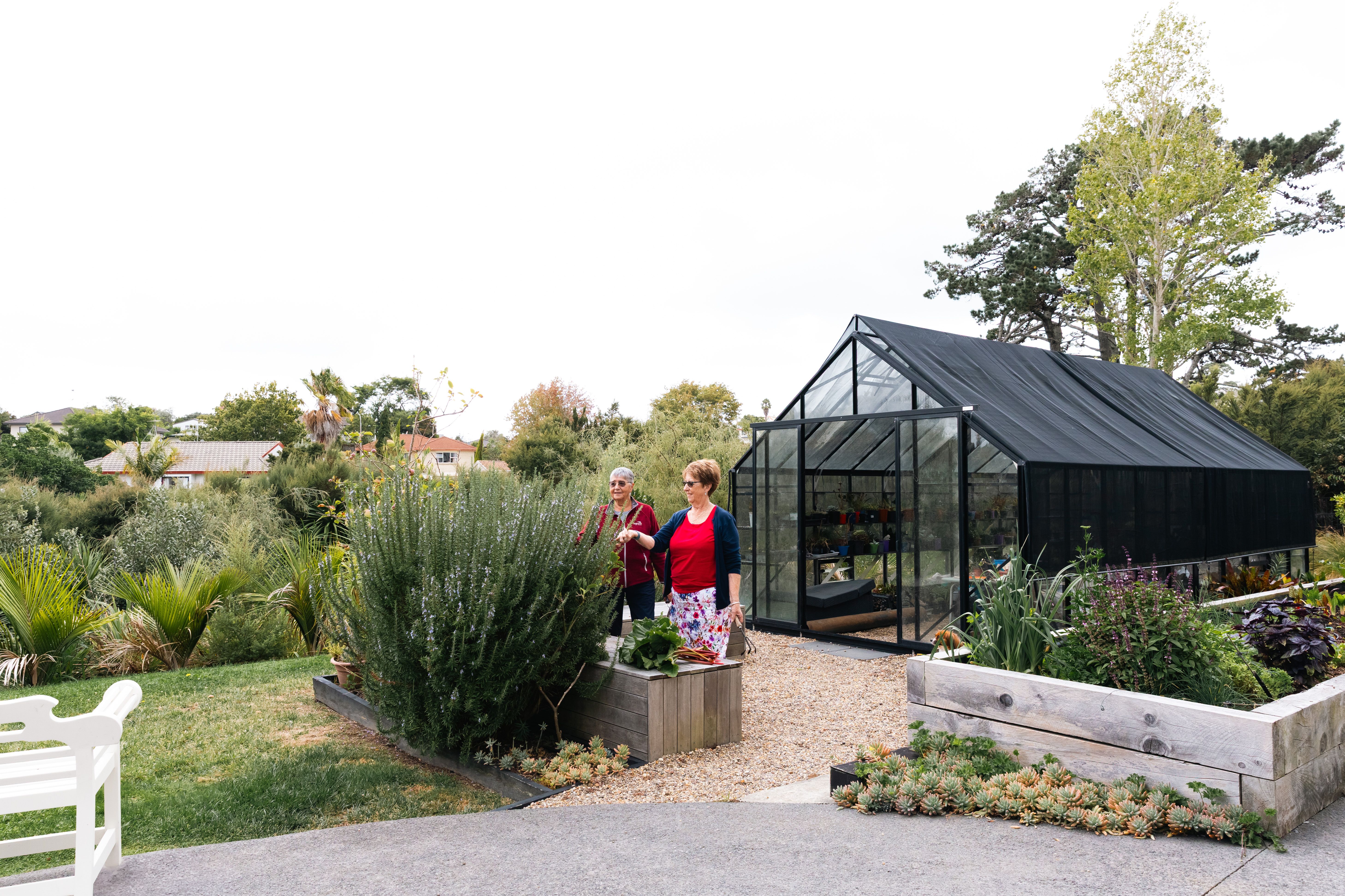 Residents in the village garden at Greenwich Gardens