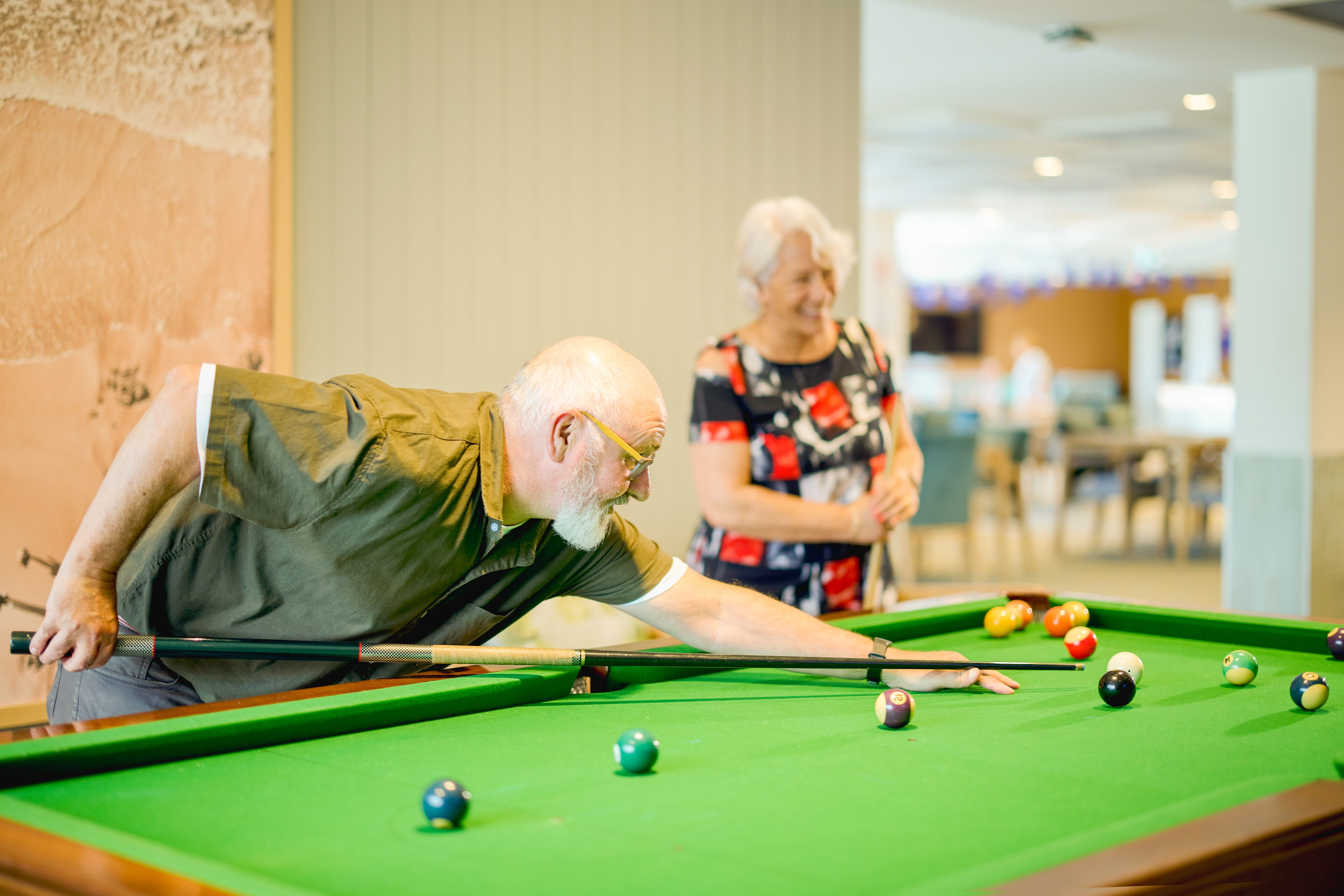 Residents playing pool