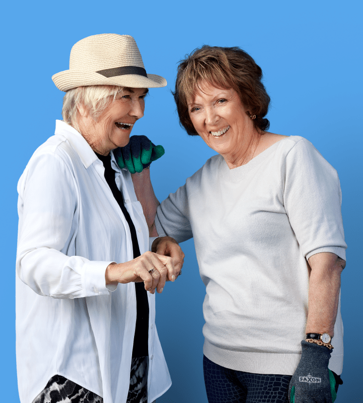 Ladies laughing on blue background